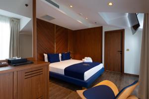 Postel nebo postele na pokoji v ubytování Kate Hotel Special Class & SPA