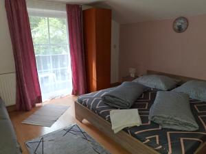 Postel nebo postele na pokoji v ubytování Pension Nachtviole