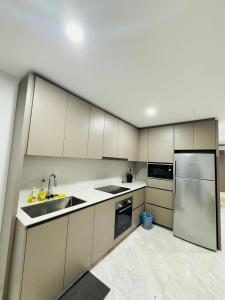 Kuchyň nebo kuchyňský kout v ubytování Eaton Service Apartment at KLCC