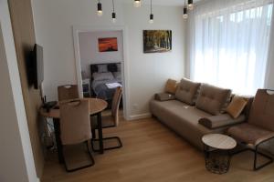 Posezení v ubytování 2 pok Apartament Bryza 150m od jeziora