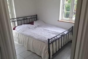 Postel nebo postele na pokoji v ubytování Marku House 2-plans huse