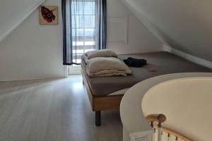 Postel nebo postele na pokoji v ubytování Marku House 2-plans huse