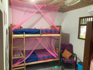 Palanda nebo palandy na pokoji v ubytování Hostel Singha Lounge