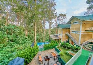Zahrada ubytování Areva Inn Plantation Resort Munnar with Pool by VOYE HOMES