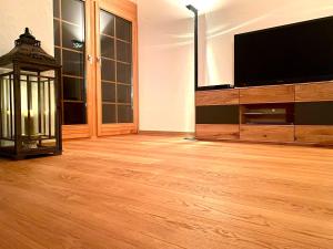 TV a/nebo společenská místnost v ubytování Heidahüs Penthouse