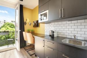 Η κουζίνα ή μικρή κουζίνα στο YAYS Paris Zola by Numa +51 φωτογραφίες