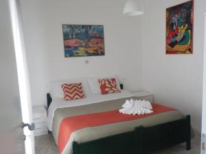 Postel nebo postele na pokoji v ubytování Hotel Migani