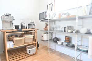 مطبخ أو مطبخ صغير في insidey 海から歩いて10分 walk from the sea Tatadobeach Iritabeach 10min