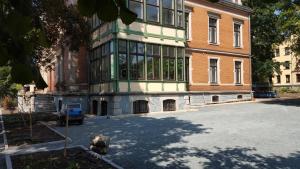 a large building with a lot of windows on it at Villa Dietel Greiz in Greiz +8 photos
