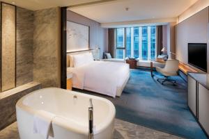 TV o dispositivi per l'intrattenimento presso Hilton Quanzhou Riverside