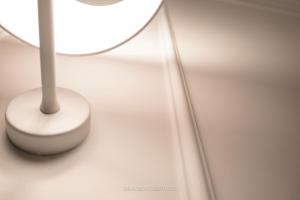 a white table with a lamp and a white floor at DIMORA CARDUCCI in Bari +72 photos