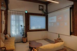 Posezení v ubytování Gangneung Chodang Yogi-suk + 13 fotografií