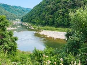 a view of a river in a valley at Inje Rainbow Pension in Inje +4 photos