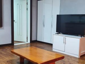 TV a/nebo společenská místnost v ubytování Pension Sea Travel House Taean