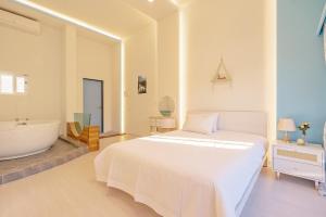 Postel nebo postele na pokoji v ubytování Gyeongju Edis Poolvilla