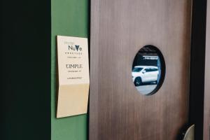Vottorð, verðlaun, skilti eða annað skjal til sýnis á Hotel NuVe Heritage