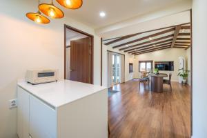 Η κουζίνα ή μικρή κουζίνα στο Jeju Sagyaeoreum Dockchae