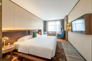 Φωτογραφία από το άλμπουμ του Echarm PLUS Hotel - Jingdezhen Taoxichuan στο Jingdezhen