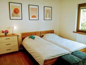 Postel nebo postele na pokoji v ubytování Apartma Discovering Slovenia