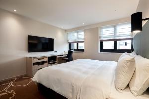 TV a/nebo společenská místnost v ubytování K Hotel Taipei II