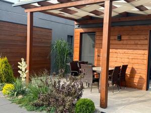 Vonkajšia záhrada v ubytovaní CISZA Bungalows Village / Blisko Natury