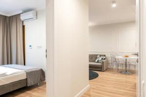 Posteľ alebo postele v izbe v ubytovaní Mennica Residence Luxury Location