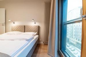 Posteľ alebo postele v izbe v ubytovaní Mennica Residence Luxury Location