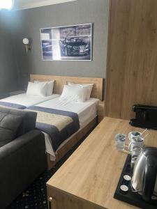 Letto o letti in una camera di Autopapa
