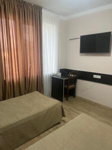 Letto o letti in una camera di Autopapa