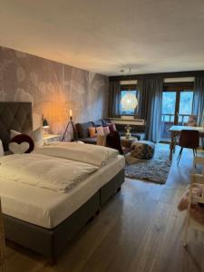 Postel nebo postele na pokoji v ubytování Appartements im Weiherhof,