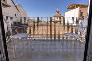 Un balcón o terraza de Hotel Sacromonte