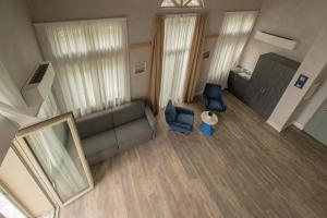 Posezení v ubytování Hotel Al Campanile - Luxury Suites & Apartments