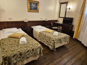 Krevet ili kreveti u jedinici u okviru objekta Taanilinna Hotell