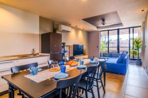 Χώρος καθιστικού στο Urban Resort Villa ILILANI