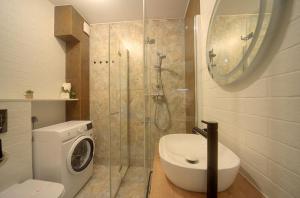 Kúpeľňa v ubytovaní Trevilles Apartamenty Pogodny + 26 fotografií