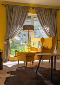 Posedenie v ubytovaní Trevilles Apartamenty Pogodny