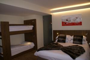Hotel L’Ermita B&B客房内的一张或多张床位