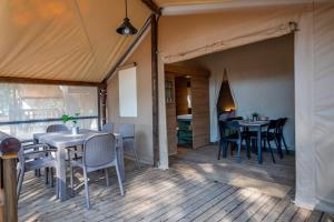 Reštaurácia alebo iné gastronomické zariadenie v ubytovaní Camping & Resort La Torre del Sol