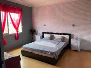 Ένα ή περισσότερα κρεβάτια σε δωμάτιο στο Chambre zen