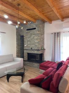 Posezení v ubytování Guest House Mali
