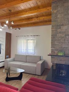 Posezení v ubytování Guest House Mali