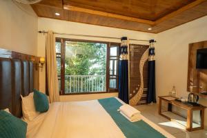 Ένα ή περισσότερα κρεβάτια σε δωμάτιο στο Hotel Blue Heaven - Best Hotel in Dalhousie +34 φωτογραφίες