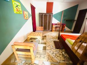Postel nebo postele na pokoji v ubytování Akwa Guesthouse Cotonou