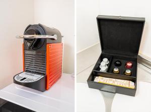an orange and black box on a table with a drawer at KYARA HOTEL 亀戸b in Tokyo