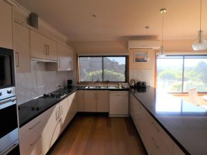 Η κουζίνα ή μικρή κουζίνα στο Chez Belle Vue