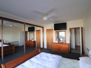 Ένα ή περισσότερα κρεβάτια σε δωμάτιο στο Chez Belle Vue