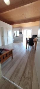 a room with a bed and a table and a couch at Schöne Drei Zimmerwohnung in Ebersbach an der Fils