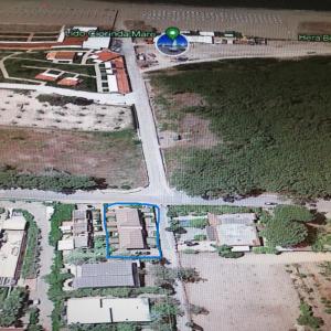 a map of a city with a blue circle at residenza acquamarina fronte mare in Paestum