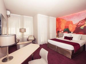 Postel nebo postele na pokoji v ubytování Mercure Limoges Centre
