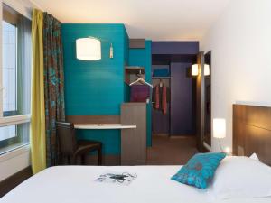 Postel nebo postele na pokoji v ubytování Ibis Styles Lyon Centre - Gare Part Dieu